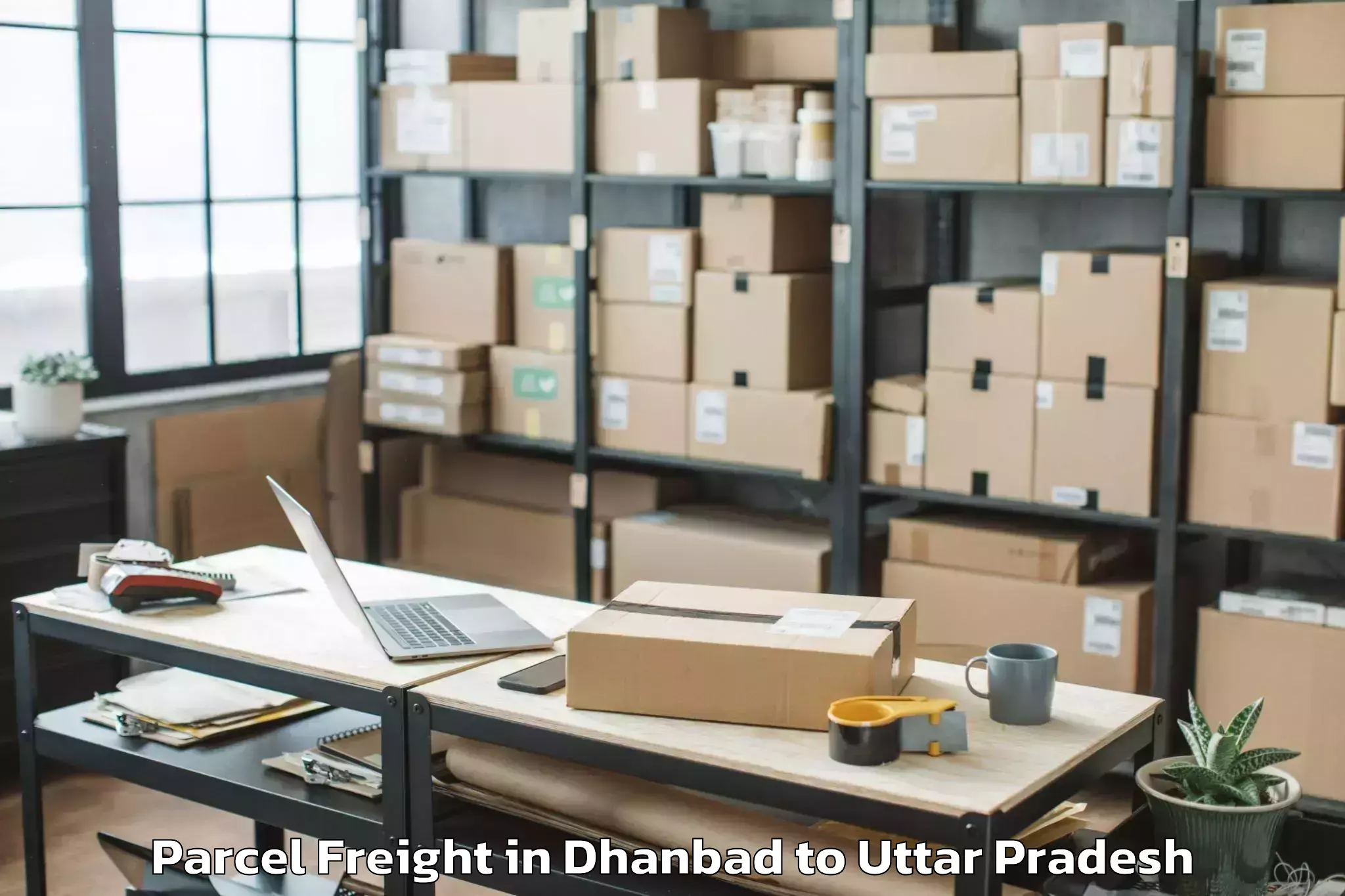 Leading Dhanbad to Beniganj Parcel Freight Provider